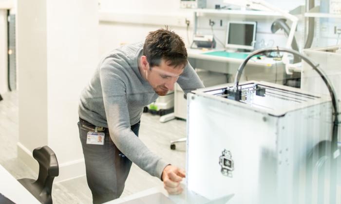 A researcher at Bristol works in the state-of-the-art Quantum Engineering Technology Labs 