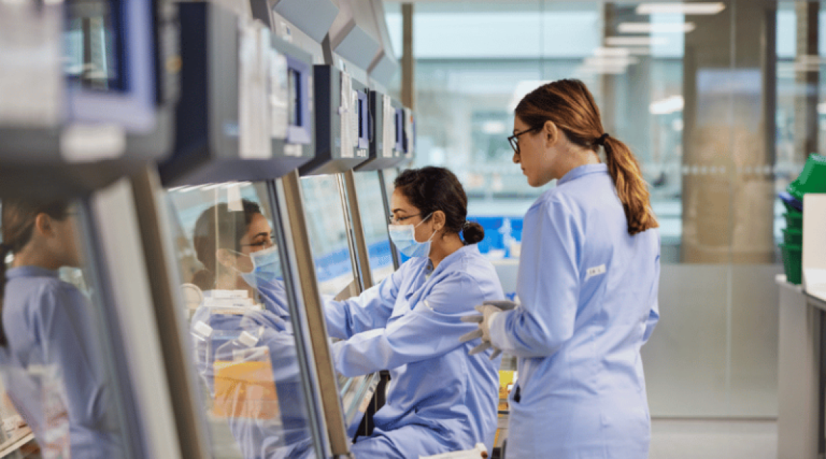 Two female researchers work in a laboratory at Autolus